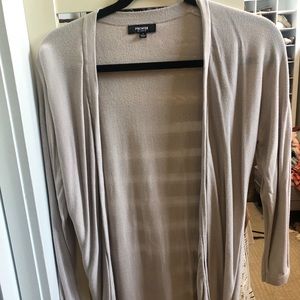 Cardigan with tapered sides